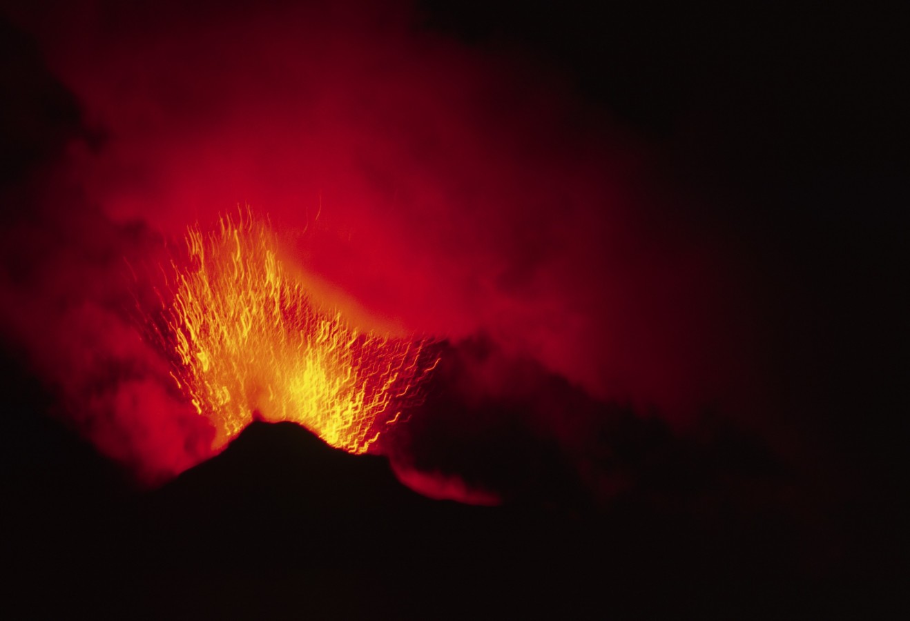 The Stromboli vulcano, active fireworks at the top after sunset